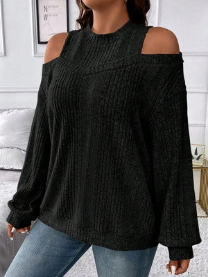Black ribbed mock neck cold shoulder top with long sleeves.