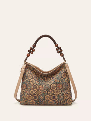 Vibrant bohemian hobo tote with geometric pattern and beaded handle