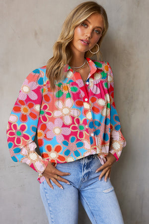 Multicolor floral print blouse with blouson sleeves and button front.