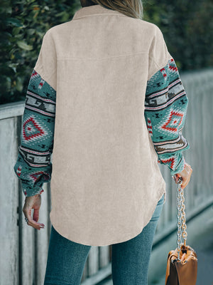 Corduroy shacket in Dust Storm with Aztec print sleeves and collar.