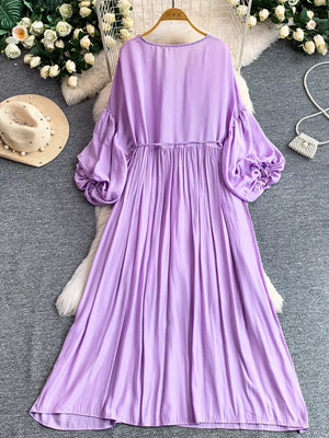 Purple bohemian maxi dress with balloon sleeves and cinched waist
