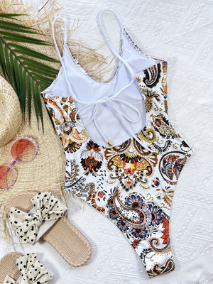 White paisley print one-piece swimsuit with tie-back detail