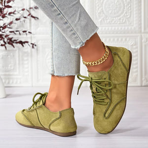 Lace Up Round Toe Sneakers in Brown, model styling view
