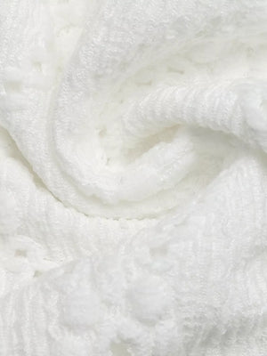 White lace-trimmed ruffle sleeve maternity shirt detail