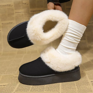 Black plush suede platform ankle boots with cream faux fur trim and white slouch socks.