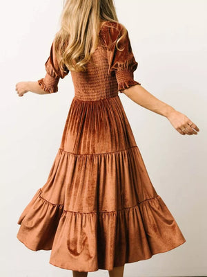 Caramel velvet midi dress with smocked bodice and ruffled puff sleeves