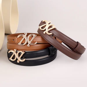Premium cowhide leather belts in black, brown, and caramel with gold logo buckle.