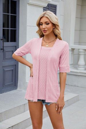 Layered knit square neck top in blush pink with open weave detail and short sleeves.