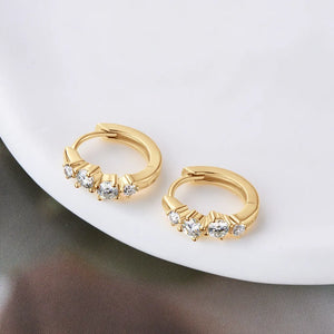 Gold mini hoop earrings with pavé crystal embellishments
