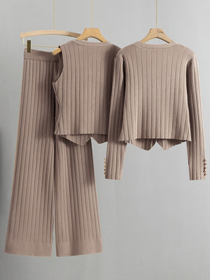 Taupe ribbed knit ensemble with gold button details on sleeves and wide-leg pants.
