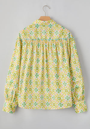 Yellow green floral ruffle yoke button-down blouse with tiered sleeves.