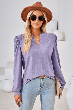 Lavender textured blouse with bishop sleeves and V-neck