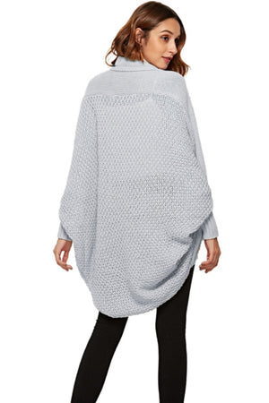 Light gray acrylic cocoon knit cardigan with shawl collar and batwing sleeves.