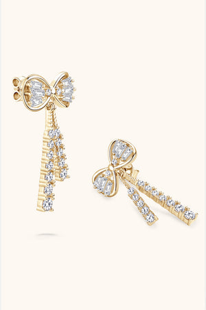 Gold baguette bow drop earrings with diamond accents