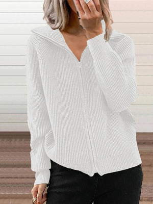 White ribbed knit zip-front trench coat with collar detail.