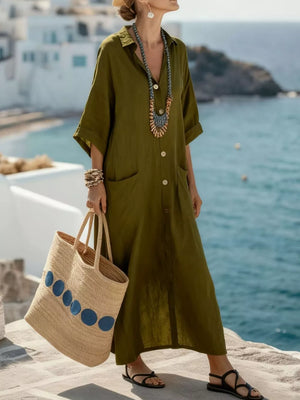 Olive green button-front maxi dress with 3/4 sleeves and pockets