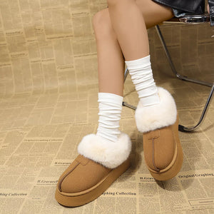 Brown plush suede platform ankle boots with fluffy white trim and white slouch socks.