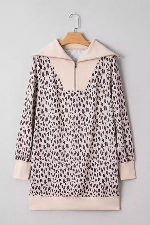 Leopard print cotton mini dress with zip-up collar and long sleeves.