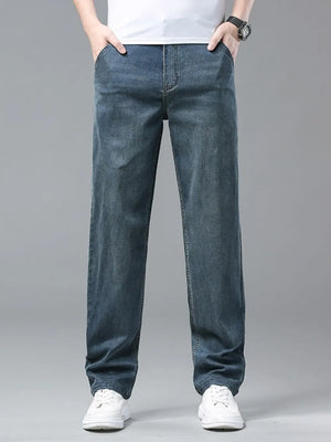 Relaxed fit washed blue sweatpants with a comfortable casual style.