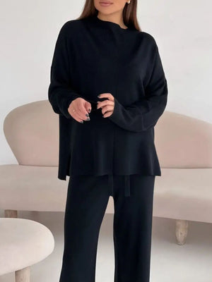Black relaxed fit knit co-ord set with a mock neck top and drawstring pants.