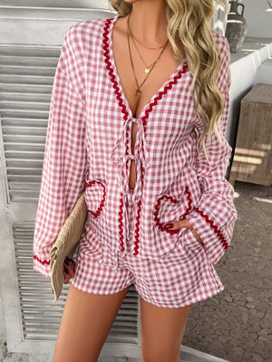 Pink gingham loungewear set with tie-front top and heart pockets.