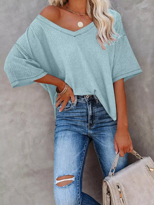Light blue waffle knit relaxed v-neck t-shirt with short sleeves.