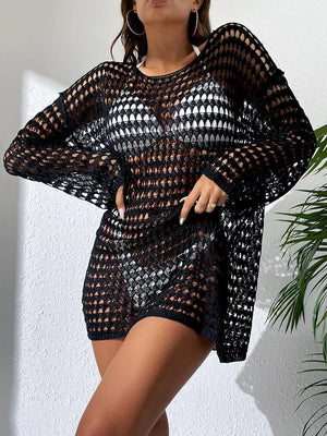 Black sheer crochet knit cover-up with openwork pattern and long sleeves.