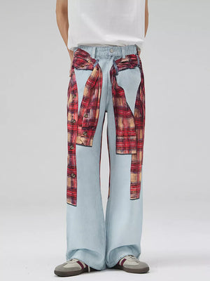Men's light wash wide-leg jeans with red plaid patchwork details and button accents.