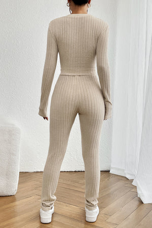 Beige ribbed knit co-ord set with long sleeves and fitted pants.