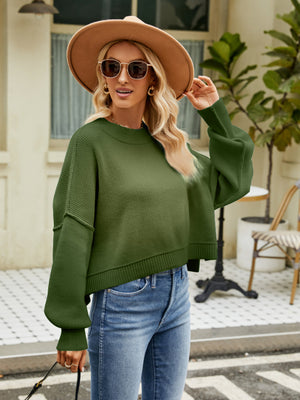 Dropped shoulder knit sweater in Army Green with balloon sleeves and ribbed texture.