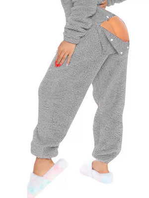 Light gray fleece hooded romper with open back detail and button closure.