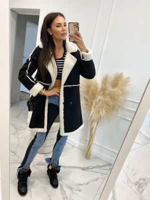 Black suede effect overcoat with white shearling trim and collar, double-breasted closure