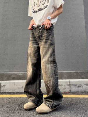 Men's vintage wash wide-leg jeans in relaxed fit, featuring distressed details and a comfortable cotton fabric.