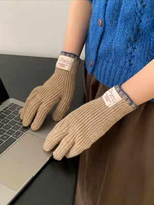 Ribbed knit gloves in mocha with blue scalloped cuff and Bonjour tag detail.