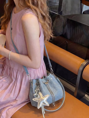 Drawstring Bucket Crossbody Bag in Blue, front view
