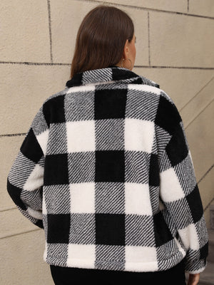 Black and white plaid shacket with fluffy texture and collar detail.