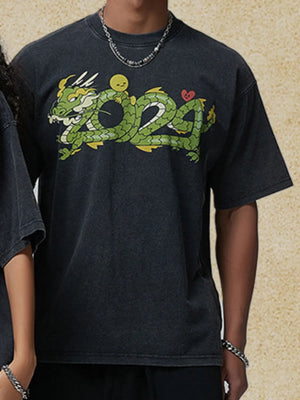 Black washed cotton t-shirt with a green dragon graphic and "2024" text.