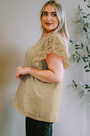 Khaki eyelet flutter sleeve tee with scalloped trim and breathable fabric.