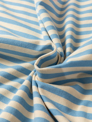 Light blue and cream striped cotton t-shirt with a soft, casual feel.