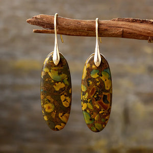 Verdant Stone Elongated Drop Earrings in gold with unique speckled pattern.