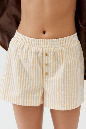 Seersucker boxer shorts in Pastel Yellow and white stripes with button fly and elastic waist.
