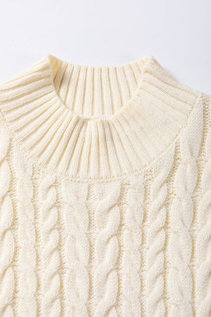 Ivory cable knit mock neck vest with ribbed collar and chunky knit texture.