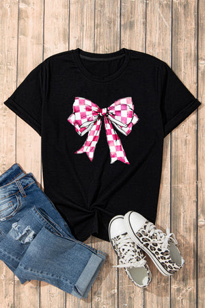 Black t-shirt with a pink and white gingham bow graphic, crew neck, short sleeves.