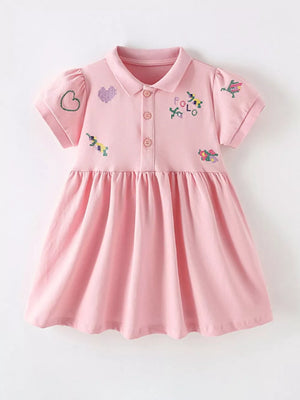 Pink cotton blend baby dress with embroidered details and polo collar.