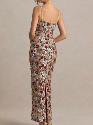 Floral sequin maxi dress with spaghetti straps and a thigh-high slit.