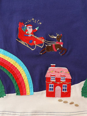 Toddler dress with Santa in sleigh, reindeer, rainbow, and house embroidery.
