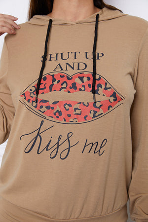 Khaki hoodie with leopard print lips and "Kiss Me" graphic.