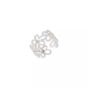 Sterling silver open ring with a delicate floral motif and small crystal accents.
