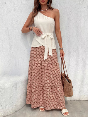Cream one-shoulder top with tie waist and geometric maxi skirt set