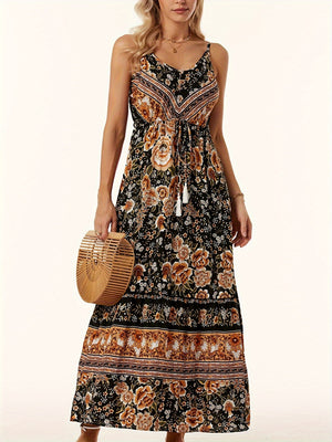 Black floral maxi dress with adjustable waist tie and tassel detail.